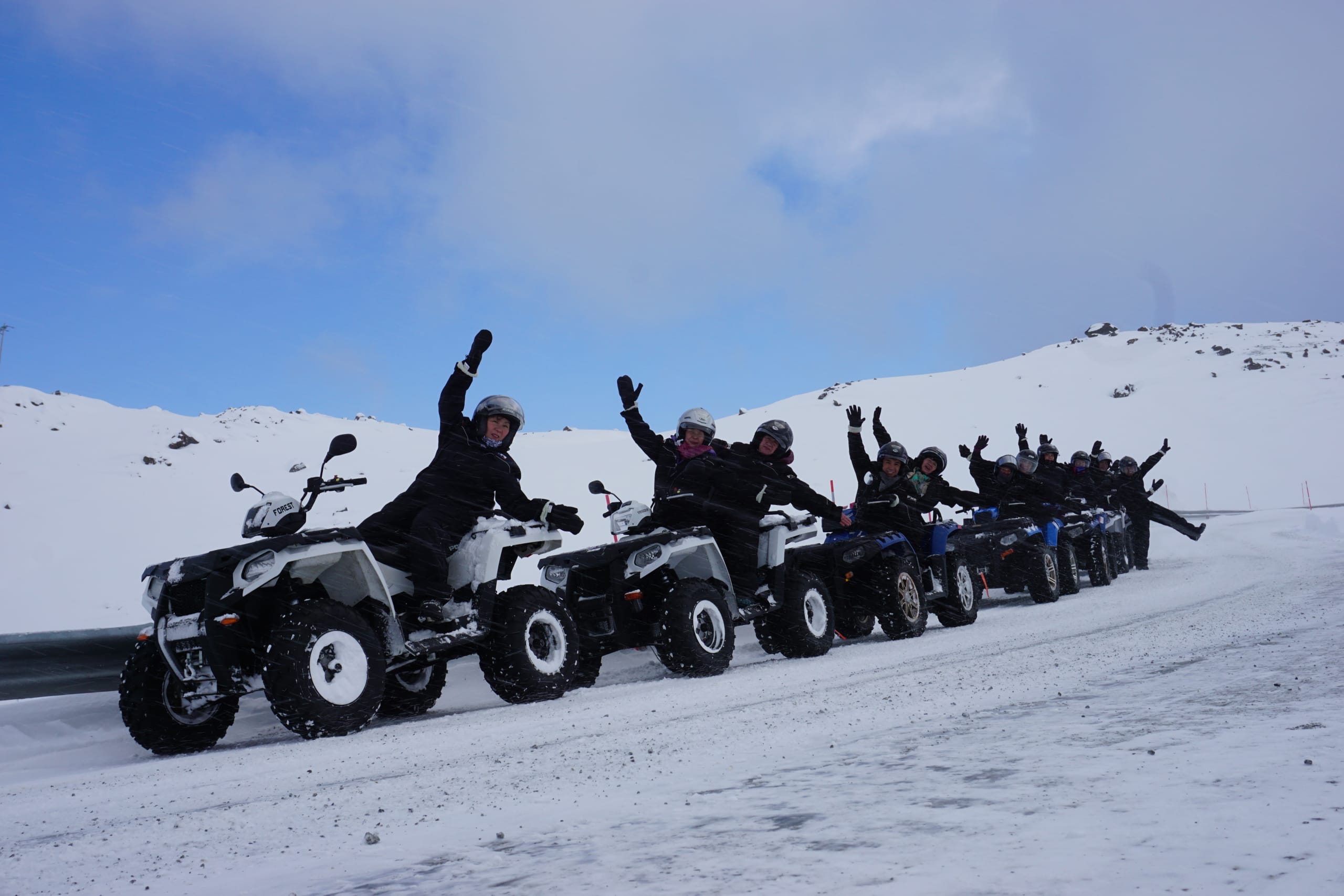 Happy people on North Cape ATV safari winter
