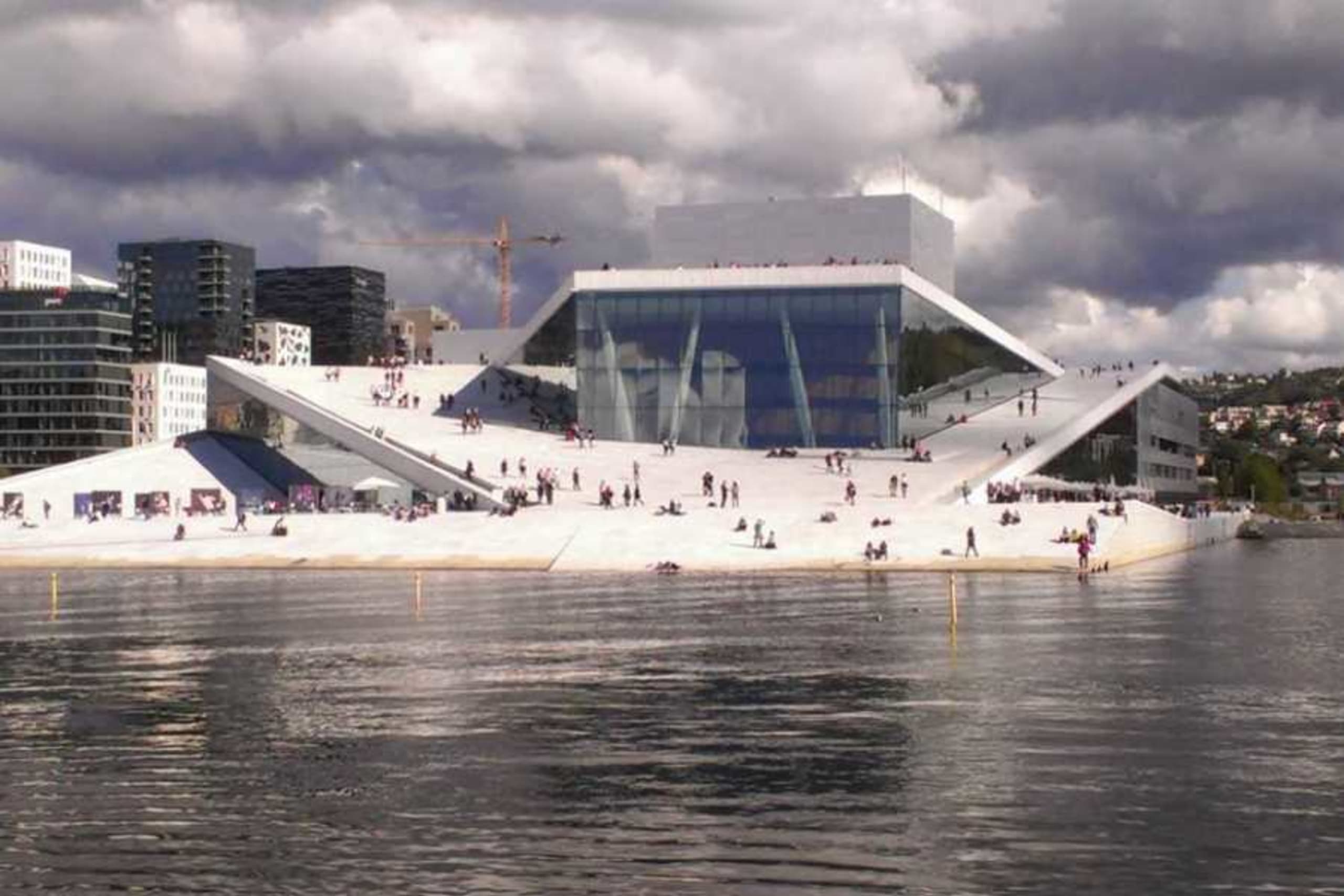 A view of the Oslo Opera House seen from the water.