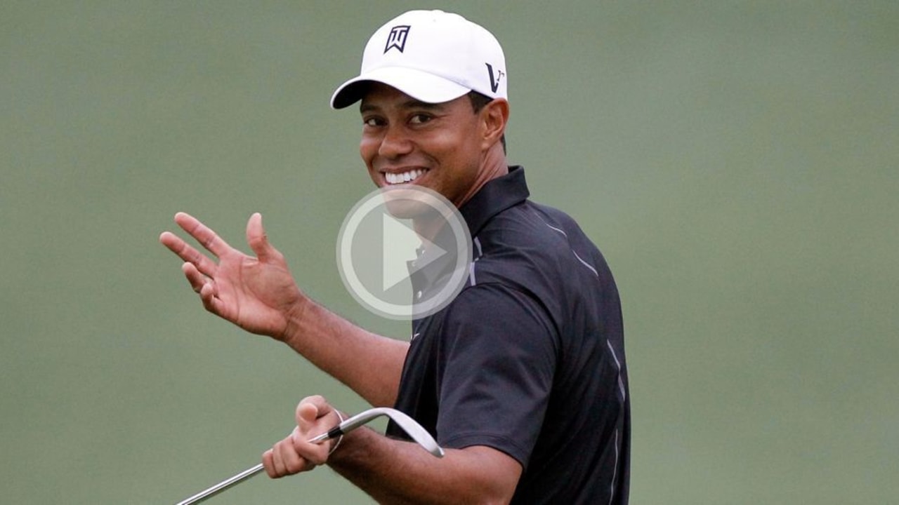 Tiger Woods lächelt
