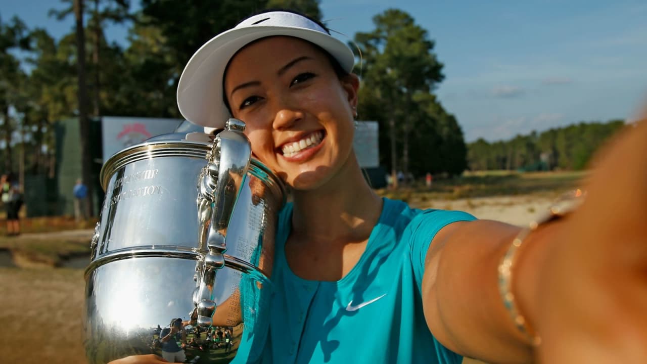 Endlich geschafft: Nach einigen enttäuschenden Jahren hält Michelle Wie 2014 ihren verdienten Pokal im Arm. (Foto: Getty)