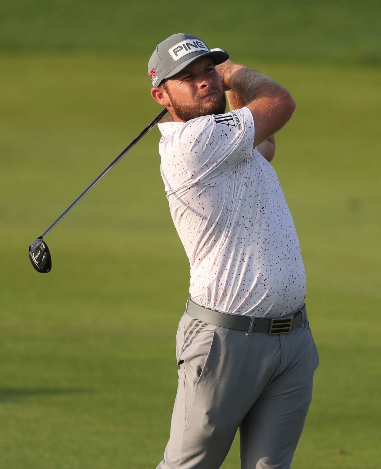 AL MUROOJ, SAUDI ARABIA - FEBRUARY 03: Tyrrell Hatton of England plays his second shot on the 18th hole during day one of the PIF Saudi International at Royal Greens Golf & Country Club on February 03, 2022 in Al Murooj, Saudi Arabia. (Photo by Oisin Keniry/Getty Images)