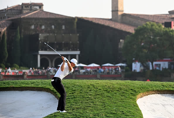 SHANGHAI, CHINA - OCTOBER 31:  Li Haotong of China plays his second shot into the par four 9th hole during the first round of the WGC HSBC Champions at Sheshan International Golf Club on October 31, 2019 in Shanghai, China. (Photo by Ross Kinnaird/Getty Images)