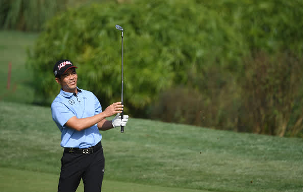 SHANGHAI, CHINA - OCTOBER 31:  Liang Wenchong of China in action during the first round of the WGC HSBC Champions at Sheshan International Golf Club on October 31, 2019 in Shanghai, China. (Photo by Ross Kinnaird/Getty Images)