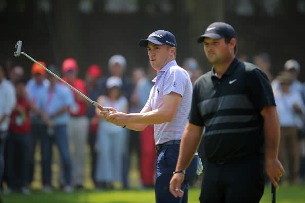MEXICO CITY, MEXICO - FEBRUARY 23: Justin Thomas of the United States and Patrick Reed of the United States look on from the fourth hole during the final round of the World Golf Championships Mexico Championship at Club de Golf Chapultepec on February 23, 2020 in Mexico City, Mexico. (Photo by Hector Vivas/Getty Images)