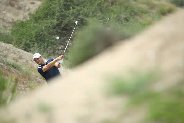 MUSCAT, OMAN - FEBRUARY 27: Martin Kaymer of Germany plays his second shot on the 9th hole during Day 1 of the Oman Open at Al Mouj Golf Complex on February 27, 2020 in Muscat, Oman. (Photo by Warren Little/Getty Images)
