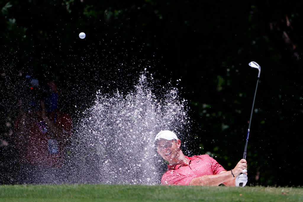 FORT WORTH, TEXAS - JUNE 11: Rory McIlroy of Northern Ireland plays a shot from a bunker on the fifth hole during the first round of the Charles Schwab Challenge on June 11, 2020 at Colonial Country Club in Fort Worth, Texas. (Photo by Tom Pennington/Getty Images)