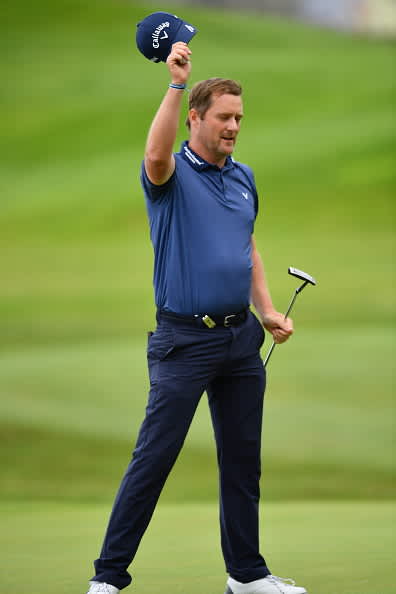 ATZENBRUGG, AUSTRIA - JULY 12: Marc Warren of Scotland celebrates on the 18th green after winning the Austrian Open at Diamond Country Club on July 12, 2020 in Atzenbrugg, Austria. (Photo by Stuart Franklin/Getty Images)