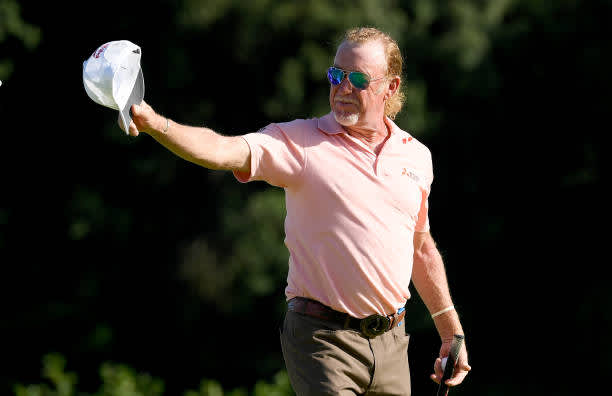 BIRMINGHAM, ENGLAND - JULY 30: Miguel Angel Jimenez of Spain acknowledges his fellow players as he walks on to the 18th green during the first round of the Hero Open at Marriott Forest of Arden on July 30, 2020 in Birmingham, England. (Photo by Ross Kinnaird/Getty Images)