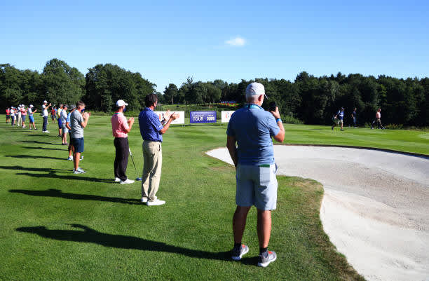 BIRMINGHAM, ENGLAND - JULY 30: Players and members of staff applaud Miguel Angel Jimenez of Spain off the 18th green as he makes his 707th European tour start, a tour appearance record during Day One of the Hero Open at Marriott Forest of Arden on July 30, 2020 in Birmingham, England. (Photo by Richard Heathcote/Getty Images)
