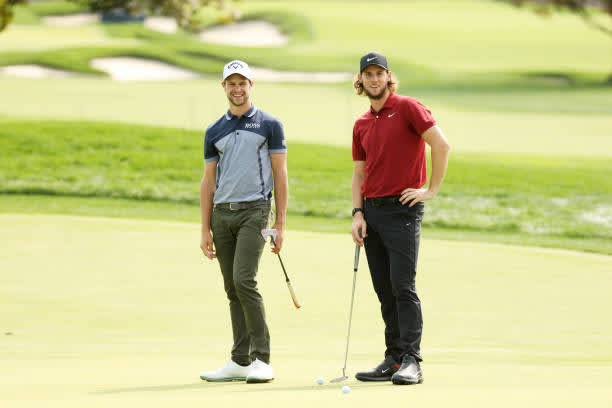 MAMARONECK, NEW YORK - SEPTEMBER 15: (L-R) Thomas Detry of Belgium and Thomas Pieters of Belgium look on from a green during a practice round prior to the 120th U.S. Open Championship on September 15, 2020 at Winged Foot Golf Club in Mamaroneck, New York. (Photo by Gregory Shamus/Getty Images)