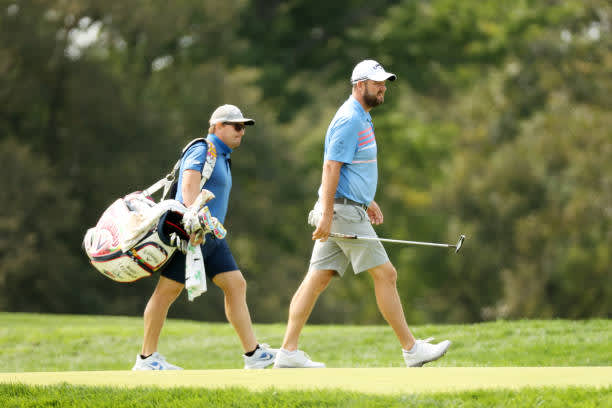 MAMARONECK, NEW YORK - SEPTEMBER 15: Marc Leishman of Australia walks with his caddie during a practice round prior to the 120th U.S. Open Championship on September 15, 2020 at Winged Foot Golf Club in Mamaroneck, New York. (Photo by Gregory Shamus/Getty Images)