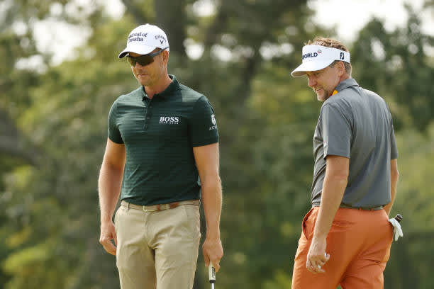 MAMARONECK, NEW YORK - SEPTEMBER 15: (L-R) Henrik Stenson of Sweden and Ian Poulter of England smile on a green during a practice round prior to the 120th U.S. Open Championship on September 15, 2020 at Winged Foot Golf Club in Mamaroneck, New York. (Photo by Gregory Shamus/Getty Images)