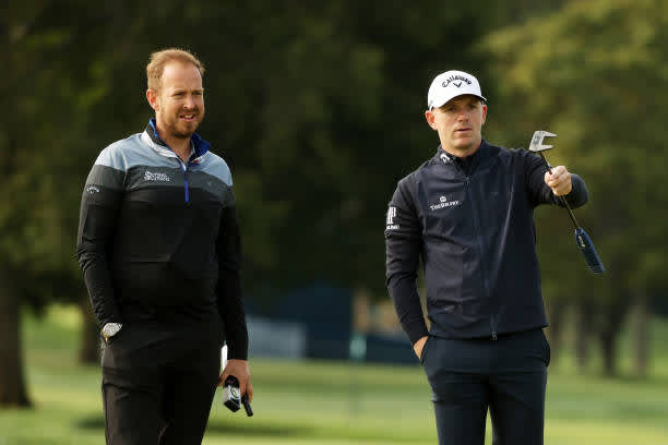 MAMARONECK, NEW YORK - SEPTEMBER 15: Matt Wallace (R) of England prepares to putt during a practice round prior to the 120th U.S. Open Championship on September 15, 2020 at Winged Foot Golf Club in Mamaroneck, New York. (Photo by Gregory Shamus/Getty Images)