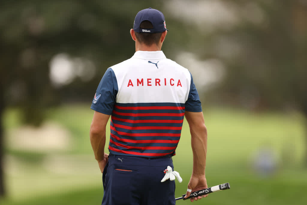 On the back Woodland also has "America" written in red on a white background.