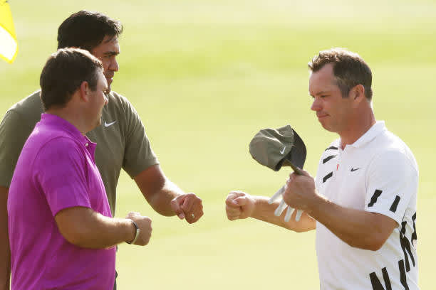 AUGUSTA, GEORGIA - NOVEMBER 12: Paul Casey of England, Tony Finau of United States and Patrick Reed of the United States shake hands during the first round of the Masters at Augusta National Golf Club on November 12, 2020 in Augusta, Georgia. (Photo by Rob Carr/Getty Images)
