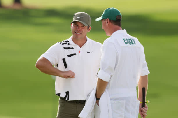 AUGUSTA, GEORGIA - NOVEMBER 12: Paul Casey of England and caddie John McLaren bump elbows during the first round of the Masters at Augusta National Golf Club on November 12, 2020 in Augusta, Georgia. (Photo by Rob Carr/Getty Images)