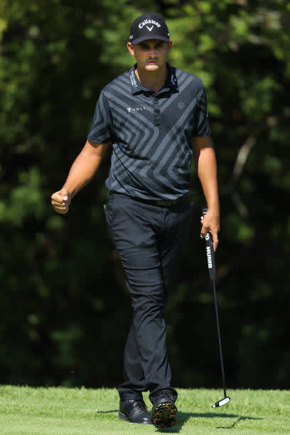 SUN CITY, SOUTH AFRICA - DECEMBER 06: Christian Bezuidenhout of South Africa reacts to a birdie on the 12th green during the final round of the South African Open at Gary Player CC on December 6, 2020 in Sun City, South Africa. (Photo by Warren Little/Getty Images)