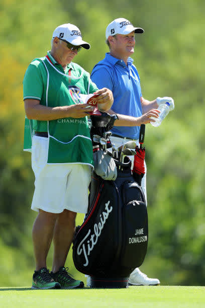 SUN CITY, SOUTH AFRICA - DECEMBER 06: Jamie Donaldson of Wales waits with his caddie on the 12th hole during the final round of the South African Open at Gary Player CC on December 6, 2020 in Sun City, South Africa. (Photo by Warren Little/Getty Images)