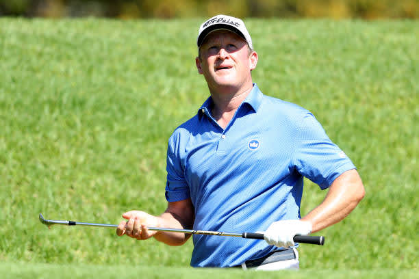 SUN CITY, SOUTH AFRICA - DECEMBER 06: Jamie Donaldson of Wales hits a bunker shot on the 11th hole during the final round of the South African Open at Gary Player CC on December 6, 2020 in Sun City, South Africa. (Photo by Warren Little/Getty Images)