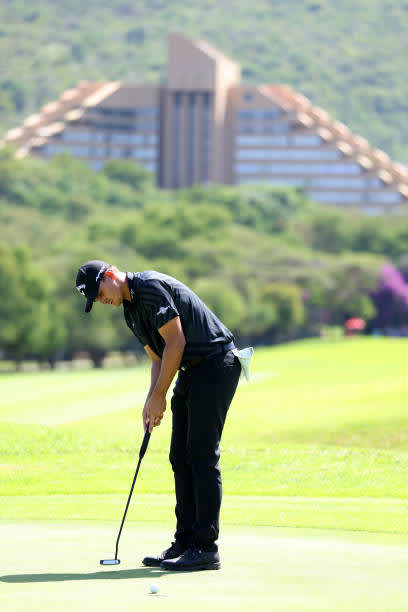 SUN CITY, SOUTH AFRICA - DECEMBER 06: Christian Bezuidenhout of South Africa putts on the 10th green during the final round of the South African Open at Gary Player CC on December 6, 2020 in Sun City, South Africa. (Photo by Richard Heathcote/Getty Images)