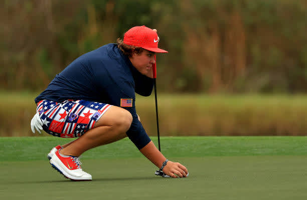 ORLANDO, FLORIDA - DECEMBER 20: Little John Daly lines up a putt on the 14th hole during the final round of the PNC Championship at the Ritz Carlton Golf Club on December 20, 2020 in Orlando, Florida. (Photo by Mike Ehrmann/Getty Images)