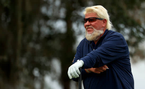 ORLANDO, FLORIDA - DECEMBER 20: John Daly hits his tee shot on the 15th hole during the final round of the PNC Championship at the Ritz Carlton Golf Club on December 20, 2020 in Orlando, Florida. (Photo by Mike Ehrmann/Getty Images)