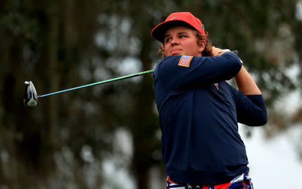 ORLANDO, FLORIDA - DECEMBER 20: Little John Daly hits his tee shot on the 15th hole during the final round of the PNC Championship at the Ritz Carlton Golf Club on December 20, 2020 in Orlando, Florida. (Photo by Mike Ehrmann/Getty Images)