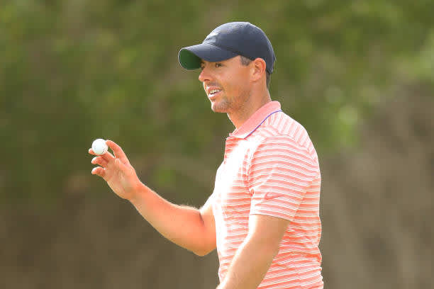 ABU DHABI, UNITED ARAB EMIRATES - JANUARY 23: Rory McIlroy of Northern Ireland acknowledges the crowd on the 10th green during Day Three of the Abu Dhabi HSBC Championship at Abu Dhabi Golf Club on January 23, 2021 in Abu Dhabi, United Arab Emirates. (Photo by Warren Little/Getty Images)