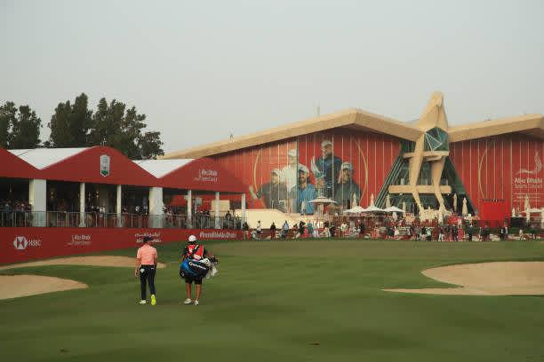 ABU DHABI, UNITED ARAB EMIRATES - JANUARY 23: Rory McIlroy of Northern Ireland walks on the 18th green during Day Three of the Abu Dhabi HSBC Championship at Abu Dhabi Golf Club on January 23, 2021 in Abu Dhabi, United Arab Emirates. (Photo by Andrew Redington/Getty Images)
