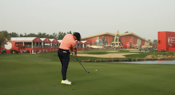 ABU DHABI, UNITED ARAB EMIRATES - JANUARY 23: Rory McIlroy of Northern Ireland plays his second shot on the 18th hole during Day Three of the Abu Dhabi HSBC Championship at Abu Dhabi Golf Club on January 23, 2021 in Abu Dhabi, United Arab Emirates. (Photo by Andrew Redington/Getty Images)