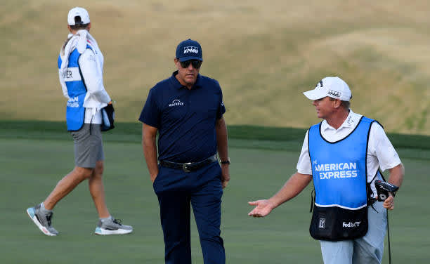 LA QUINTA, CALIFORNIA - JANUARY 22: Phil Mickelson reacts to his par putt on the 17th hole during the second round of The American Express tournament on the Stadium course at PGA West on January 22, 2021 in La Quinta, California. (Photo by Harry How/Getty Images)