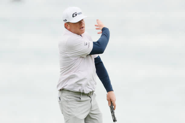 PEBBLE BEACH, CALIFORNIA - FEBRUARY 14: Nate Lashley of the United States reacts on the 18th green during the final round of the AT&T Pebble Beach Pro-Am at Pebble Beach Golf Links on February 14, 2021 in Pebble Beach, California. (Photo by Steph Chambers/Getty Images)