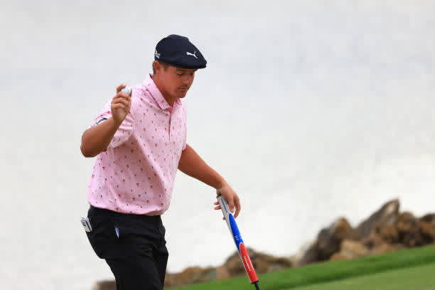 ORLANDO, FLORIDA - MARCH 06: Bryson DeChambeau of the United States waves on the 18th green during the third round of the Arnold Palmer Invitational Presented by MasterCard at the Bay Hill Club and Lodge on March 06, 2021 in Orlando, Florida. (Photo by Mike Ehrmann/Getty Images)