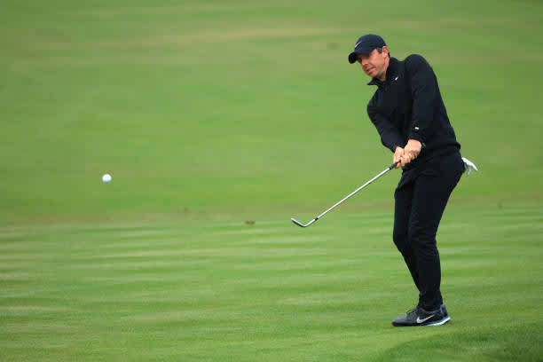 ORLANDO, FLORIDA - MARCH 06: Rory McIlroy of Northern Ireland chips to the 18th green during the third round of the Arnold Palmer Invitational Presented by MasterCard at the Bay Hill Club and Lodge on March 06, 2021 in Orlando, Florida. (Photo by Mike Ehrmann/Getty Images)