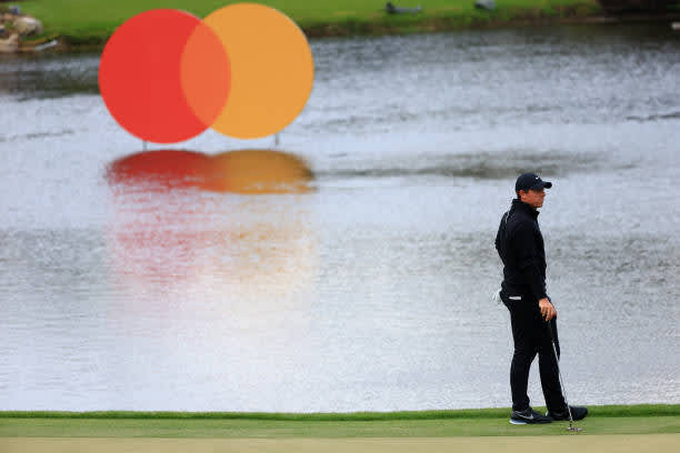 ORLANDO, FLORIDA - MARCH 06: Rory McIlroy of Northern Ireland looks on from the 18th green during the third round of the Arnold Palmer Invitational Presented by MasterCard at the Bay Hill Club and Lodge on March 06, 2021 in Orlando, Florida. (Photo by Mike Ehrmann/Getty Images)