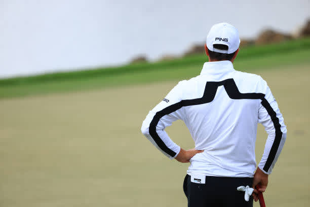 ORLANDO, FLORIDA - MARCH 06: Viktor Hovland of Norway looks on from the 18th green during the third round of the Arnold Palmer Invitational Presented by MasterCard at the Bay Hill Club and Lodge on March 06, 2021 in Orlando, Florida. (Photo by Mike Ehrmann/Getty Images)