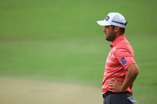 ORLANDO, FLORIDA - MARCH 06: Corey Conners of Canada looks on from the 18th green during the third round of the Arnold Palmer Invitational Presented by MasterCard at the Bay Hill Club and Lodge on March 06, 2021 in Orlando, Florida. (Photo by Mike Ehrmann/Getty Images)