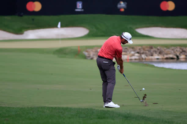 ORLANDO, FLORIDA - MARCH 06: Corey Conners of Canada plays a second shot on the 18th hole during the third round of the Arnold Palmer Invitational Presented by MasterCard at the Bay Hill Club and Lodge on March 06, 2021 in Orlando, Florida. (Photo by Sam Greenwood/Getty Images)