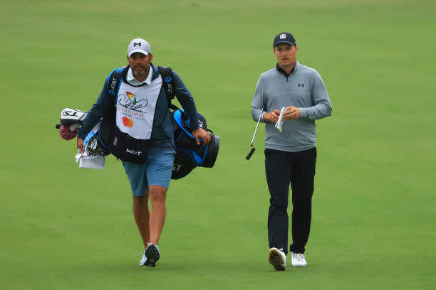 ORLANDO, FLORIDA - MARCH 06: Jordan Spieth of the United States and caddie Michael Greller (L) walk up the 18th hole during the third round of the Arnold Palmer Invitational Presented by MasterCard at the Bay Hill Club and Lodge on March 06, 2021 in Orlando, Florida. (Photo by Mike Ehrmann/Getty Images)