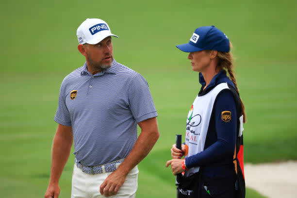ORLANDO, FLORIDA - MARCH 06: Lee Westwood of England talks with his caddie and girlfriend Helen Storey on the 18th hole during the third round of the Arnold Palmer Invitational Presented by MasterCard at the Bay Hill Club and Lodge on March 06, 2021 in Orlando, Florida. (Photo by Mike Ehrmann/Getty Images)