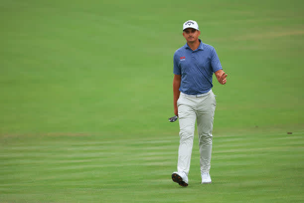 ORLANDO, FLORIDA - MARCH 06: Christiaan Bezuidenhout of South Africa walks up the 18th hole during the third round of the Arnold Palmer Invitational Presented by MasterCard at the Bay Hill Club and Lodge on March 06, 2021 in Orlando, Florida. (Photo by Mike Ehrmann/Getty Images)