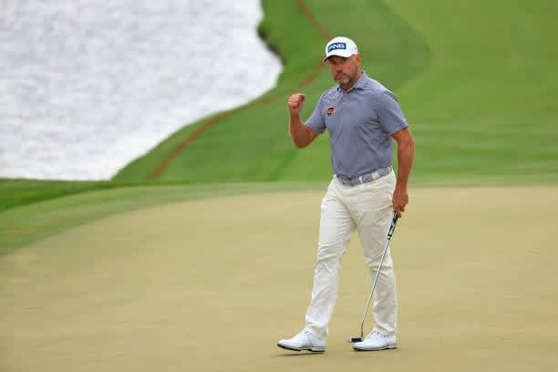 ORLANDO, FLORIDA - MARCH 06: Lee Westwood of England reacts after making a putt for birdie on the 18th green during the third round of the Arnold Palmer Invitational Presented by MasterCard at the Bay Hill Club and Lodge on March 06, 2021 in Orlando, Florida. (Photo by Mike Ehrmann/Getty Images)