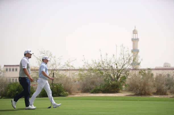 DOHA, QATAR - MARCH 13: Jack Senior of England and Jamie Donaldson of Wales walks down the seventh hole during the third round of the Commercial Bank Qatar Masters at Education City Golf Club on March 13, 2021 in Doha, Qatar. (Photo by Warren Little/Getty Images)