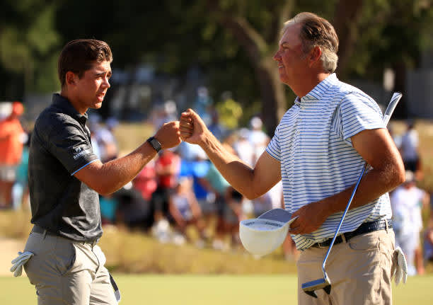 RIDGELAND, SOUTH CAROLINA - JUNE 13: Garrick Higgo of South Africa reacts with Bo Van Pelt on the 18th green during the final round of the Palmetto Championship at Congaree on June 13, 2021 in Ridgeland, South Carolina. (Photo by Mike Ehrmann/Getty Images)