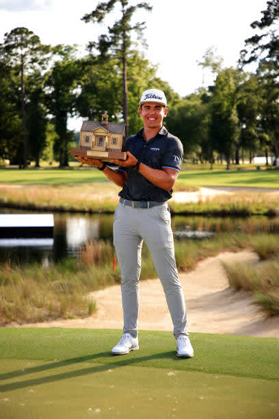 RIDGELAND, SOUTH CAROLINA - JUNE 13: Garrick Higgo of South Africa poses with the trophy after winning on the 18th green during the final round of the Palmetto Championship at Congaree on June 13, 2021 in Ridgeland, South Carolina. (Photo by Mike Ehrmann/Getty Images)