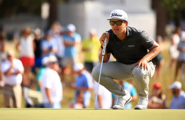 RIDGELAND, SOUTH CAROLINA - JUNE 13: Garrick Higgo of South Africa lines up a putt on the 18th green during the final round of the Palmetto Championship at Congaree on June 13, 2021 in Ridgeland, South Carolina. (Photo by Mike Ehrmann/Getty Images)