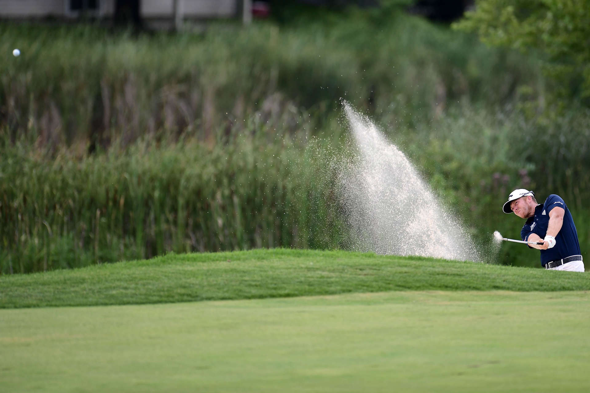 BLAINE, MINNESOTA - JULY 25: Talor Gooch of the United States plays a shot from a bunker on the tenth hole during the third round of the 3M Open on July 25, 2020 at TPC Twin Cities in Blaine, Minnesota. (Photo by Stacy Revere/Getty Images)