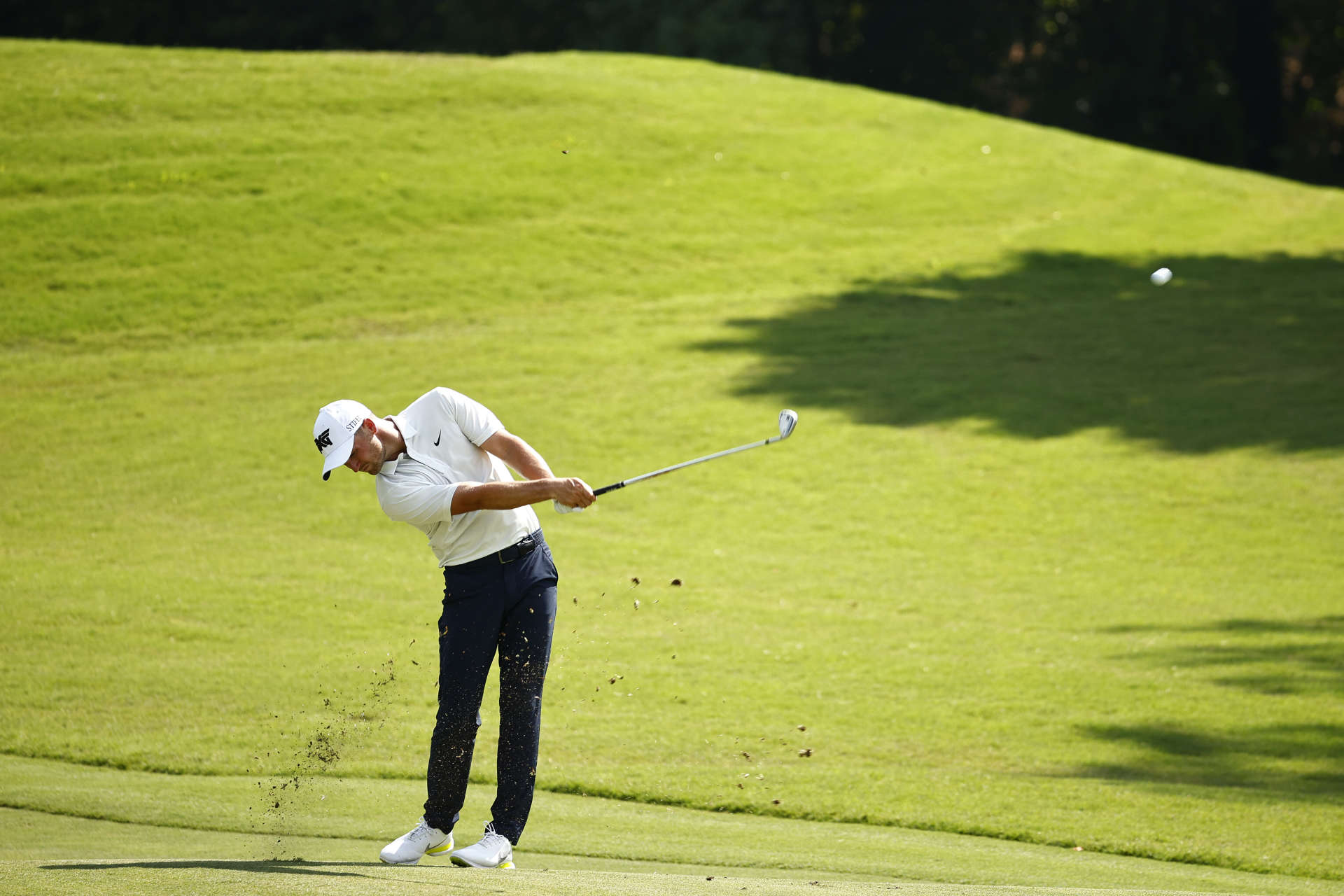 GREENSBORO, NORTH CAROLINA - AUGUST 12: Wyndham Clark of the United States plays a second shot on the 14th hole during the first round of the Wyndham Championship at Sedgefield Country Club on August 12, 2021 in Greensboro, North Carolina. (Photo by Jared C. Tilton/Getty Images)