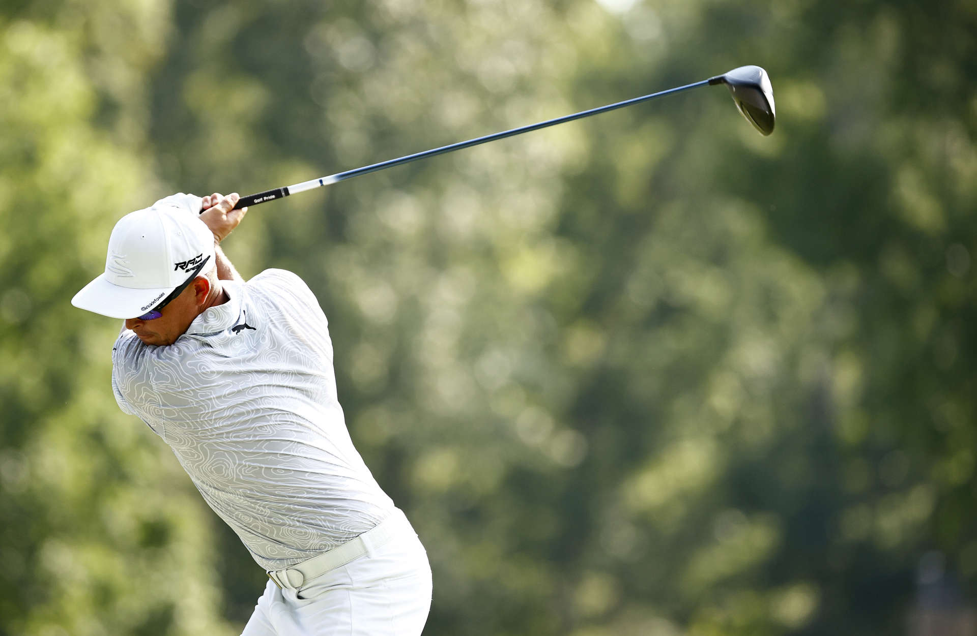 GREENSBORO, NORTH CAROLINA - AUGUST 12: Rickie Fowler of the United States plays his shot from the 15th tee during the first round of the Wyndham Championship at Sedgefield Country Club on August 12, 2021 in Greensboro, North Carolina. (Photo by Jared C. Tilton/Getty Images)