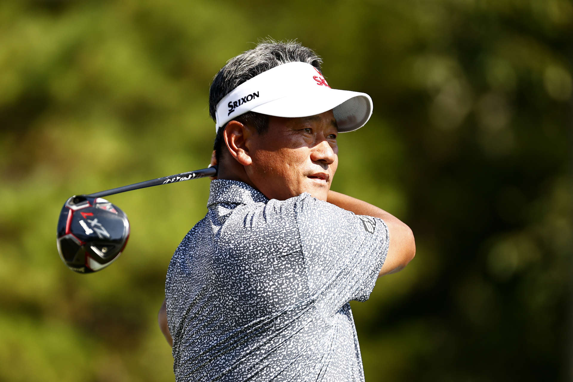 GREENSBORO, NORTH CAROLINA - AUGUST 13: K.J. Choi of South Korea plays his shot from the 18th tee during the second round of the Wyndham Championship at Sedgefield Country Club on August 13, 2021 in Greensboro, North Carolina. (Photo by Jared C. Tilton/Getty Images)